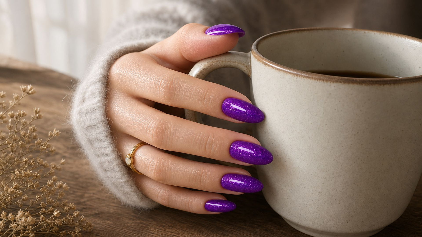 glitter press on nails worn on hand lifestyle editorial hero