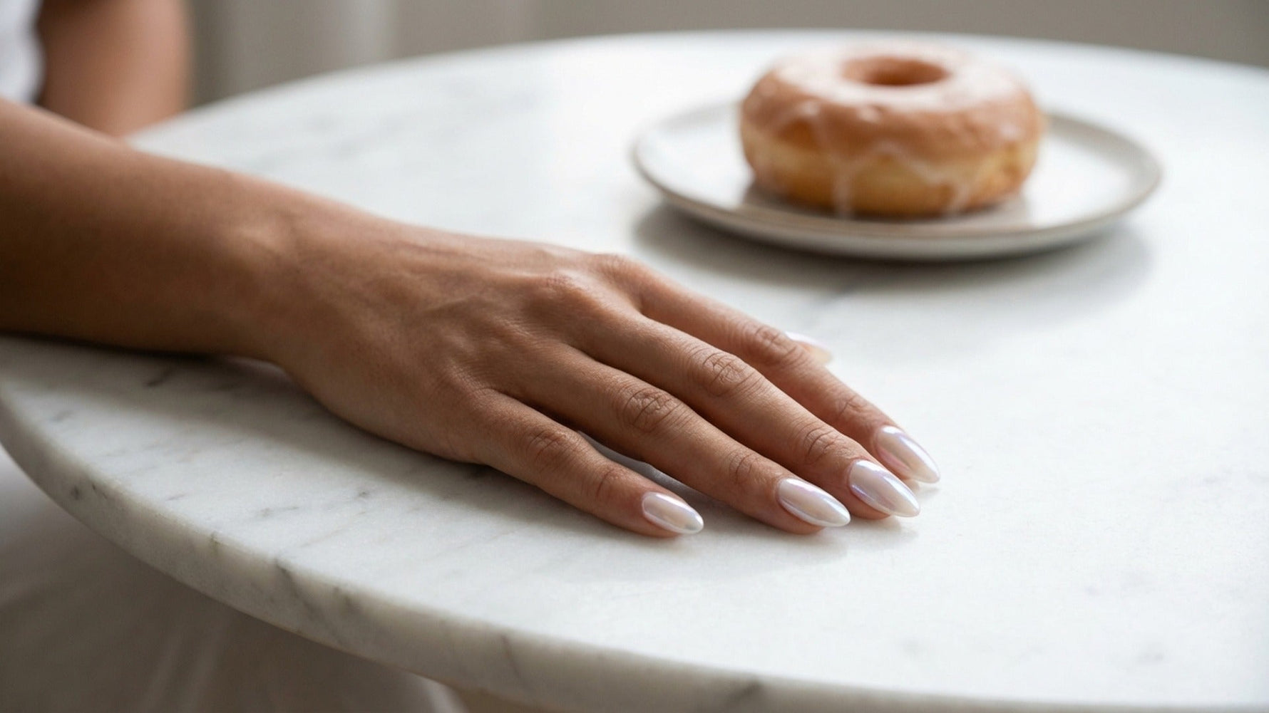 9 Hailey Bieber Glazed Donut Nail Designs to Try hero image