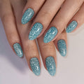 Glitzernde dunkelgrüne Softgelnägel