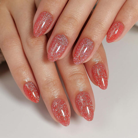Glitzernde dunkelgrüne Softgelnägel