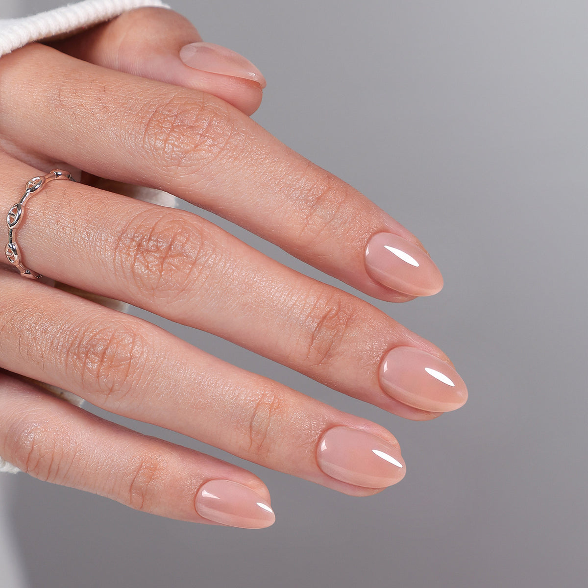Bare Petal Sheer Nude — Extra Short Almond hand model detail of the extra short almond shape | SHANGMENG®