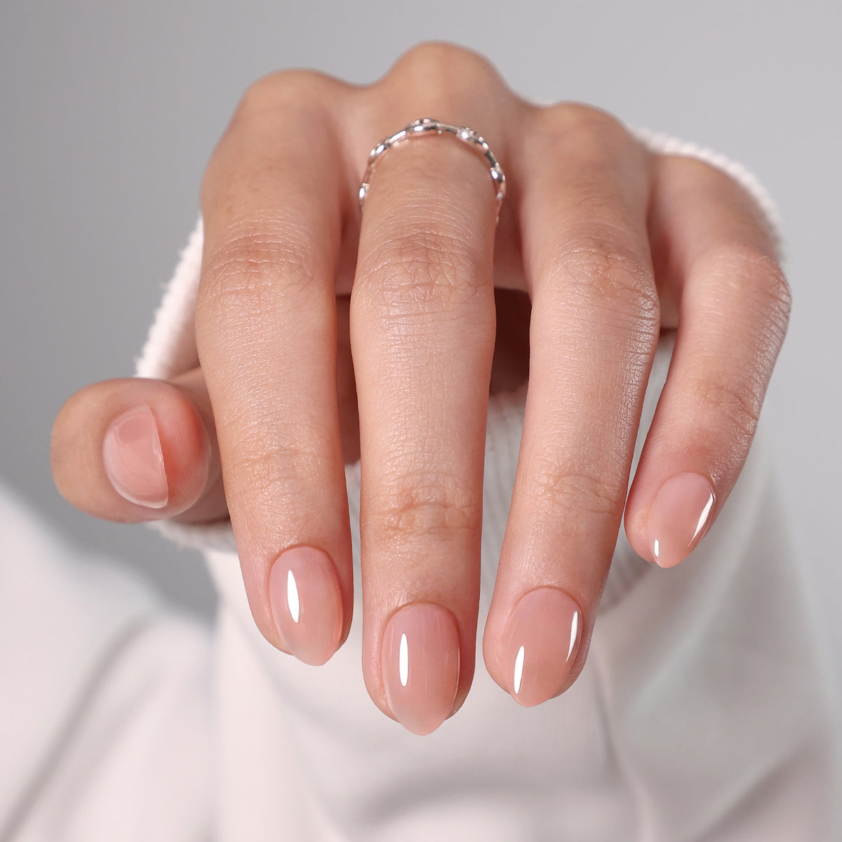 Bare Petal Sheer Nude — Extra Short Almond main hand model view | SHANGMENG®