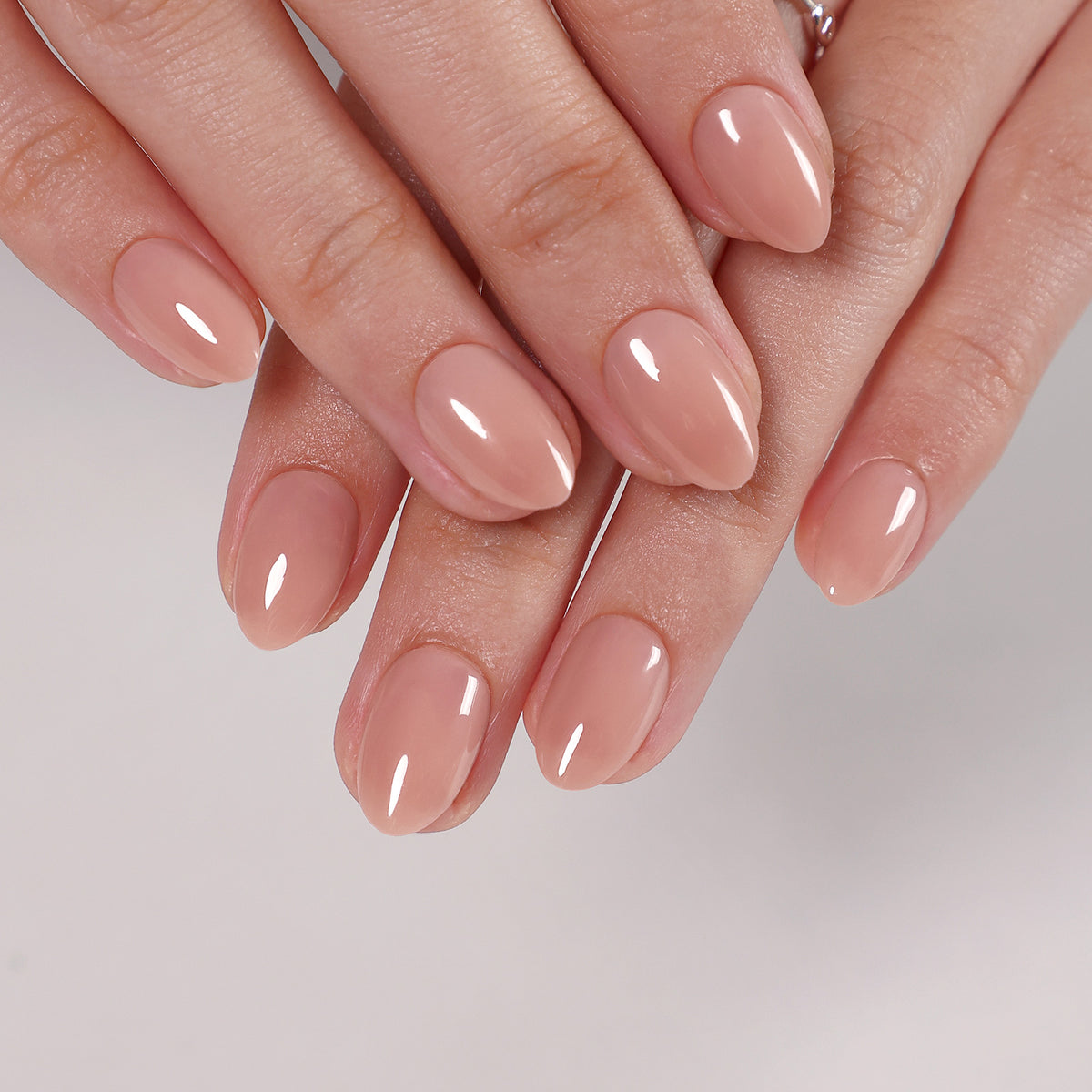 Bare Petal Sheer Nude — Extra Short Almond tilted hand view in soft light | SHANGMENG®