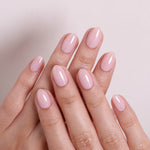 Blush Veil Pale Pink — Extra Short Almond tilted hand view in soft light | SHANGMENG®