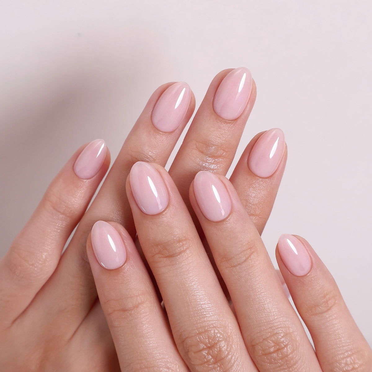 Blush Veil Pale Pink — Extra Short Almond tilted hand view in soft light | SHANGMENG®