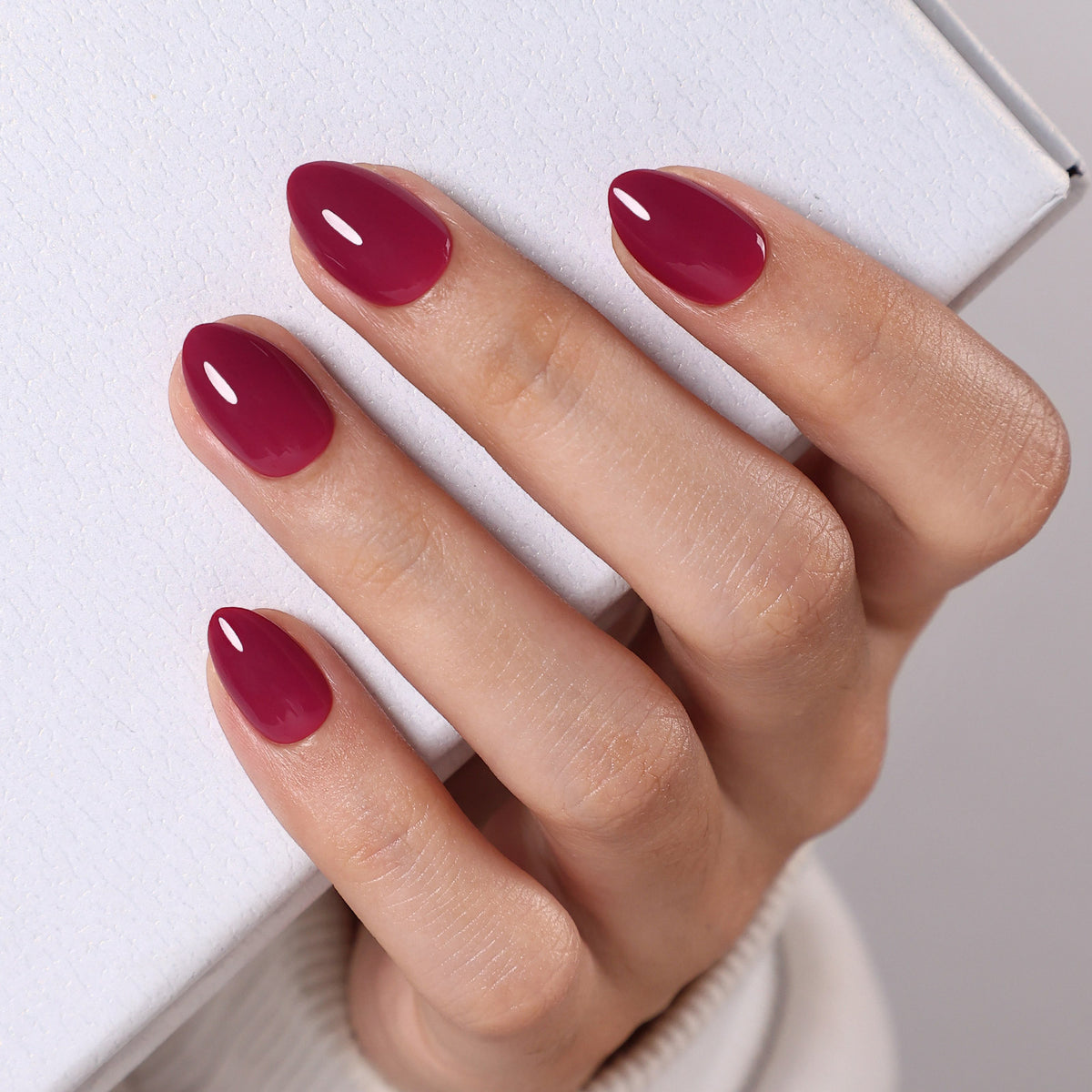 Plum Nocturne Burgundy — Extra Short Almond angled hand view of the plum burgundy extra short almond manicure | SHANGMENG®