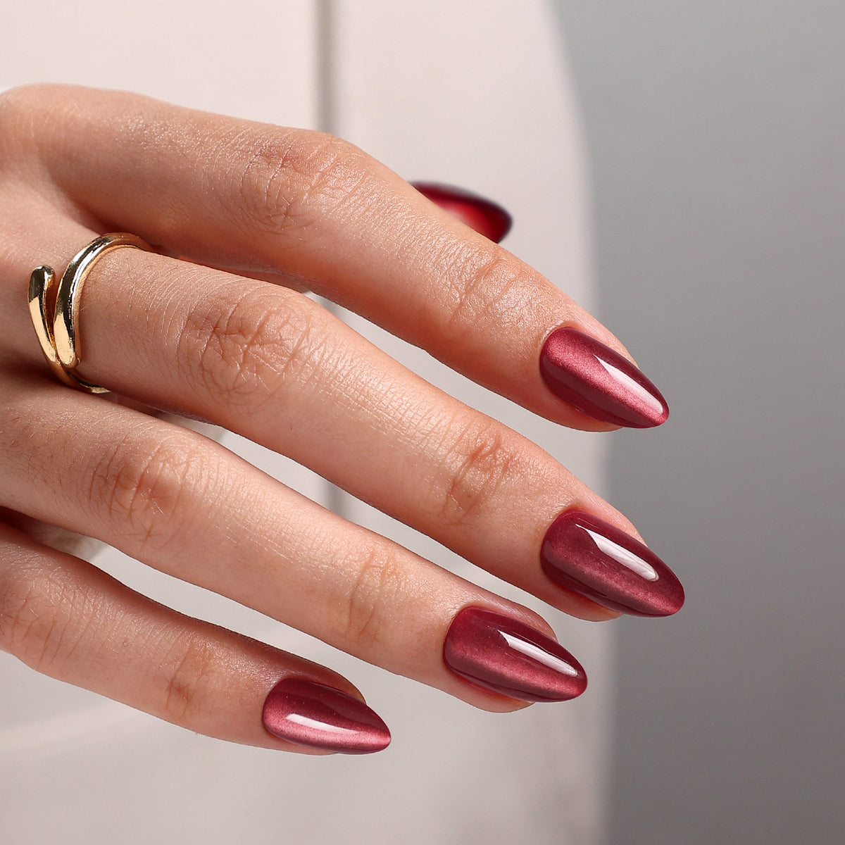 Cat Eye Burgundy Long Almond Soft Gel Press-On Nails angled hand detail view | SHANGMENG®