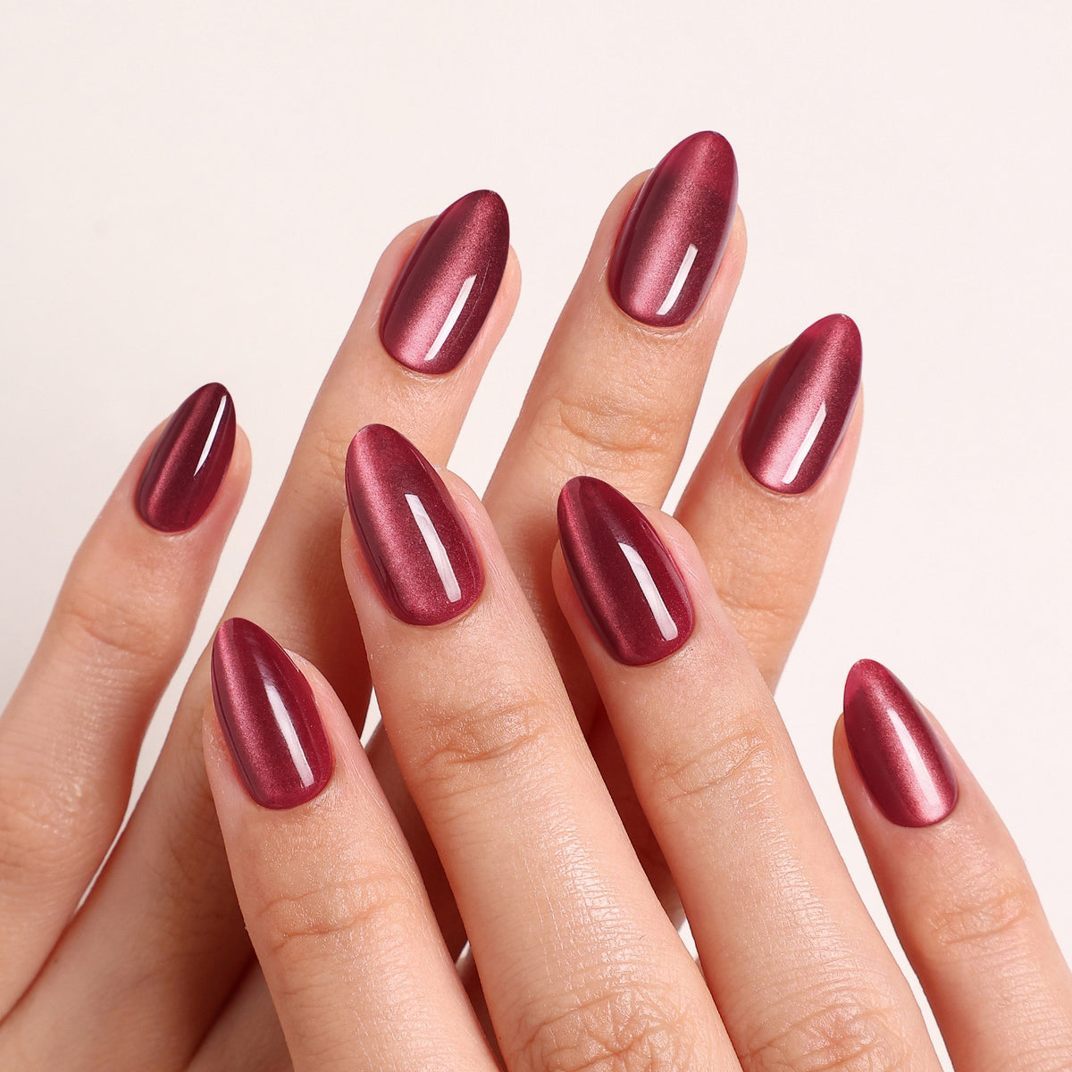 Cat Eye Burgundy Long Almond Soft Gel Press-On Nails two hand product display | SHANGMENG®