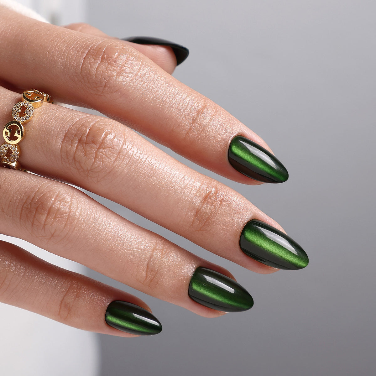Cat Eye Emerald Green Medium Almond Soft Gel Press-On Nails back of hand view one | SHANGMENG®