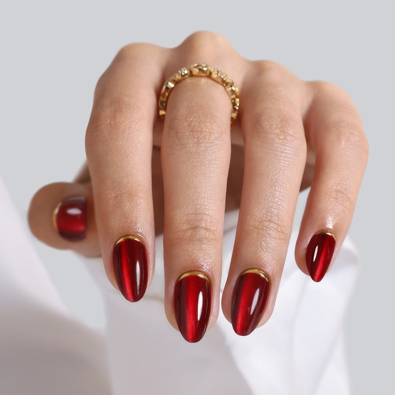 Cat Eye Gold Foil 3D Short Almond Soft Gel Press on Nails on hand angle view | SHANGMENG®