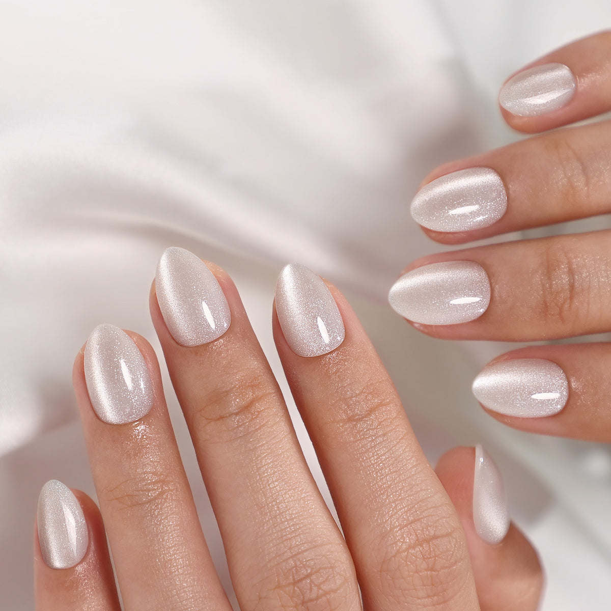 Cat Eye Pearl White Short Almond Soft Gel Press-On Nails close up nail texture view one | SHANGMENG®