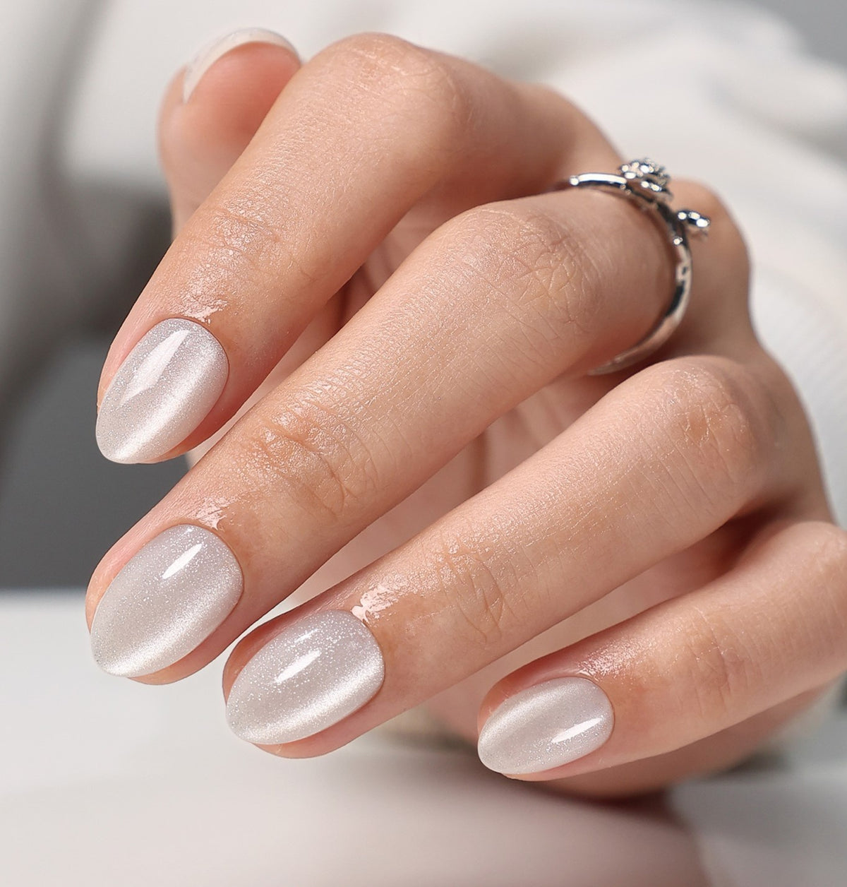 Cat Eye Pearl White Short Almond Soft Gel Press-On Nails hero hand model fan view | SHANGMENG®