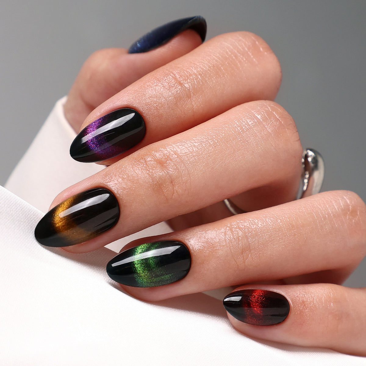 Cat Eye Short Almond Reusable Soft Gel Press-On Nails angled hand view | SHANGMENG®