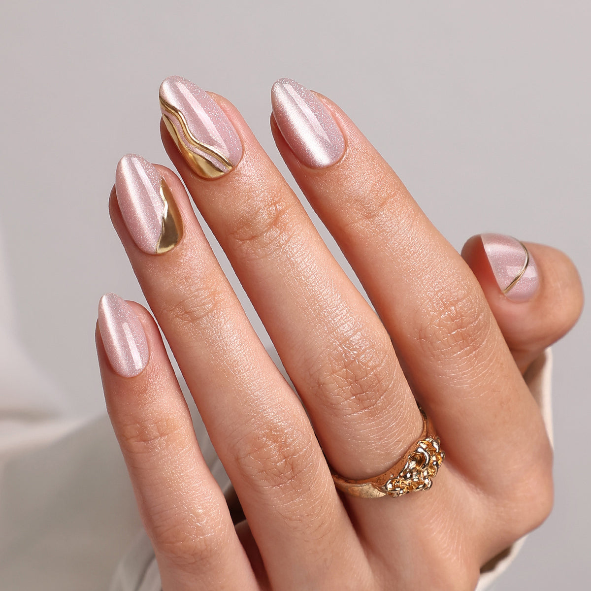 Champagne Muse Cat Eye 3D Short Almond Press-On Nails finish close-up on hand | SHANGMENG®