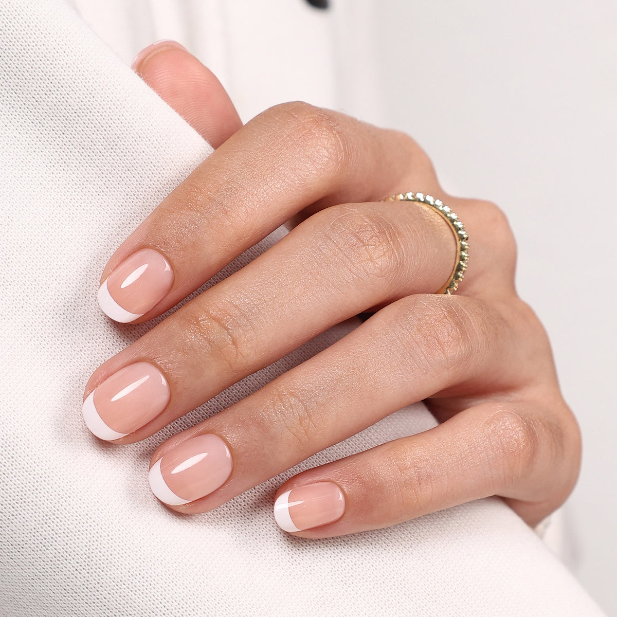 Paris Whisper French Tip — Extra Short Square angled hand view of the classic French extra short round manicure | SHANGMENG®