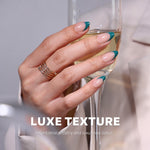 Dark Cyan French Tip Short Almond Press on Nails lifestyle holding champagne dark cyan French tip occasion | SHANGMENG®
