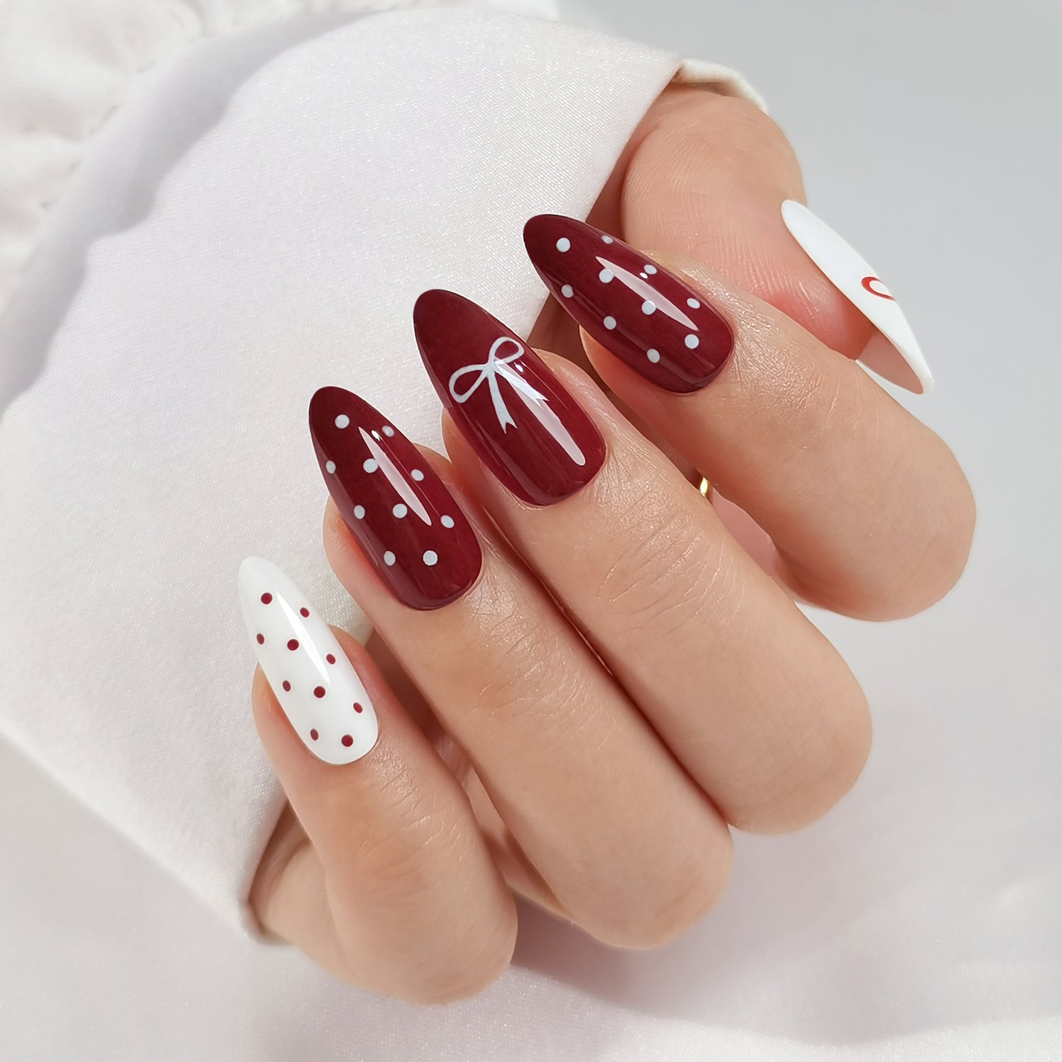 Polka Dot Dark Red and White Almond Nails