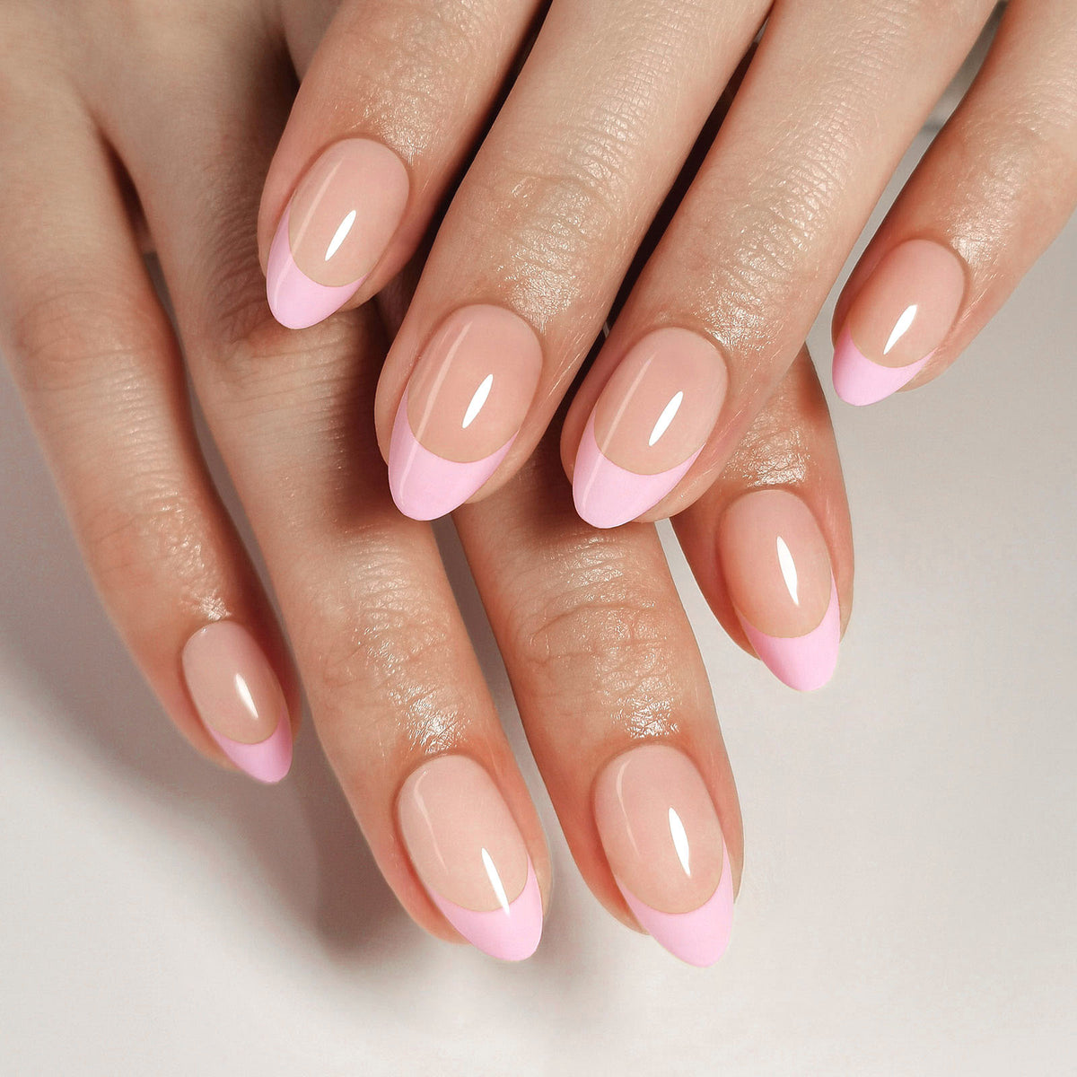 French Baby Pink Almond Reusable Soft Gel Press-On Nails finish close-up on hand | SHANGMENG®
