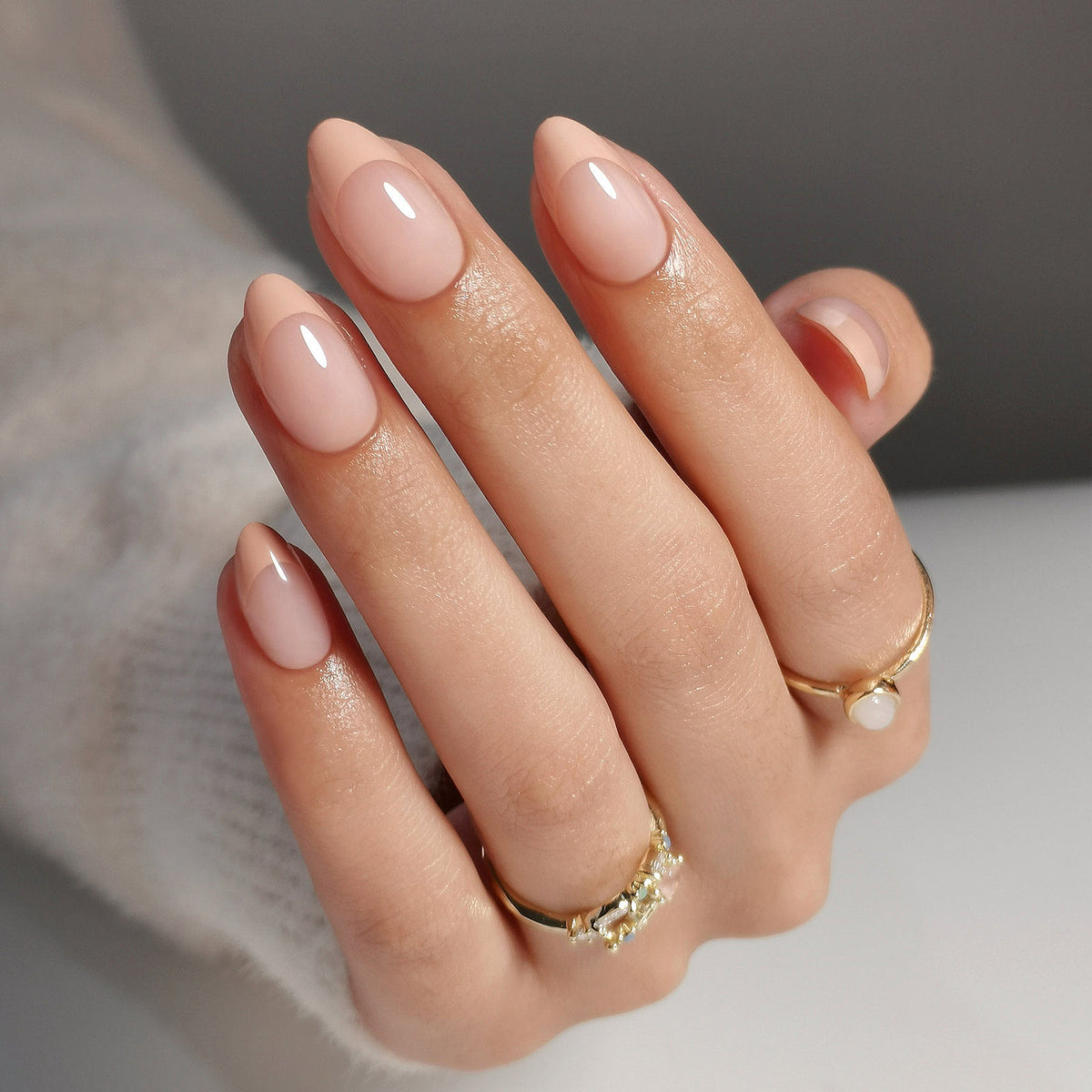 French Nude Almond Reusable Soft Gel Press-On Nails finish close-up on hand | SHANGMENG®