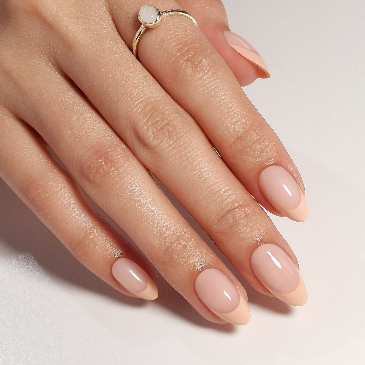 French Nude Almond Reusable Soft Gel Press-On Nails angled hand view | SHANGMENG®