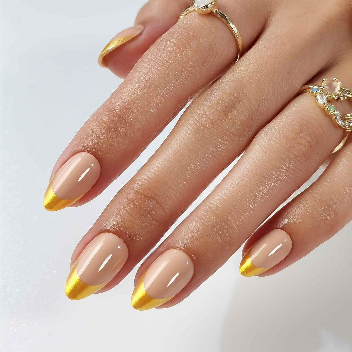 French Nude Gold Almond Reusable Soft Gel Press-On Nails hand model detail | SHANGMENG®