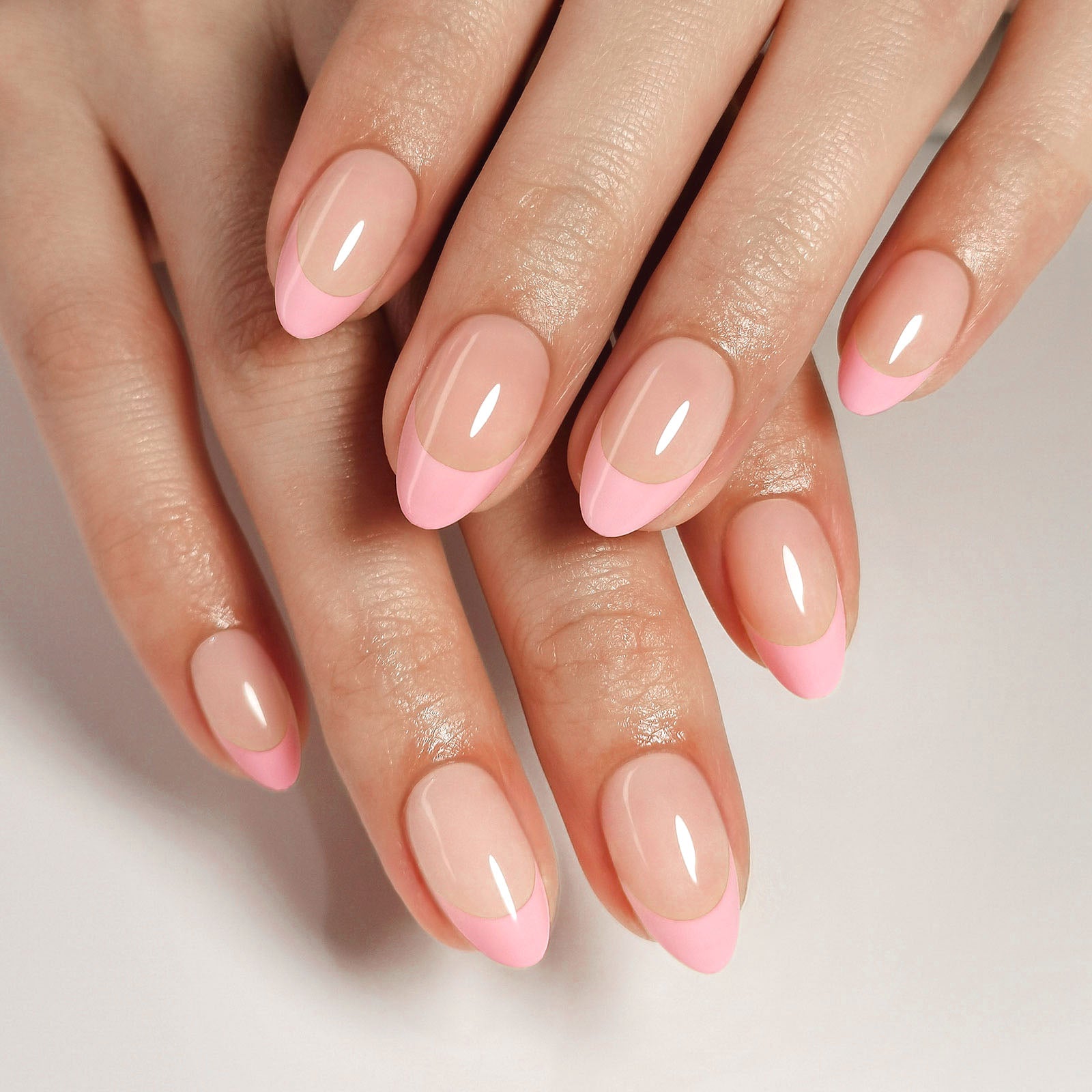 French Pink Almond Reusable Soft Gel Press-On Nails finish close-up on hand | SHANGMENG®