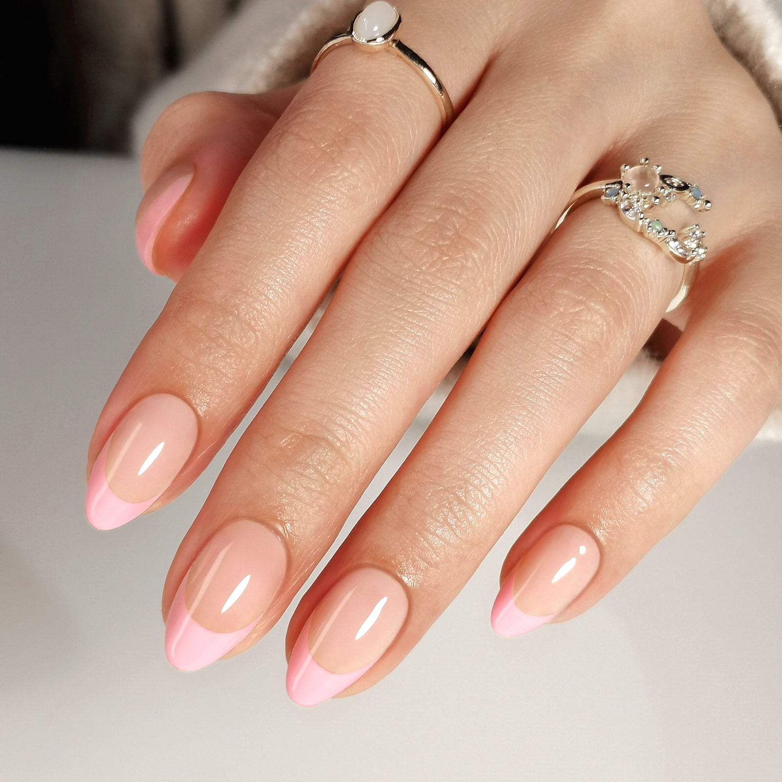 French Pink Almond Reusable Soft Gel Press-On Nails angled hand view | SHANGMENG®