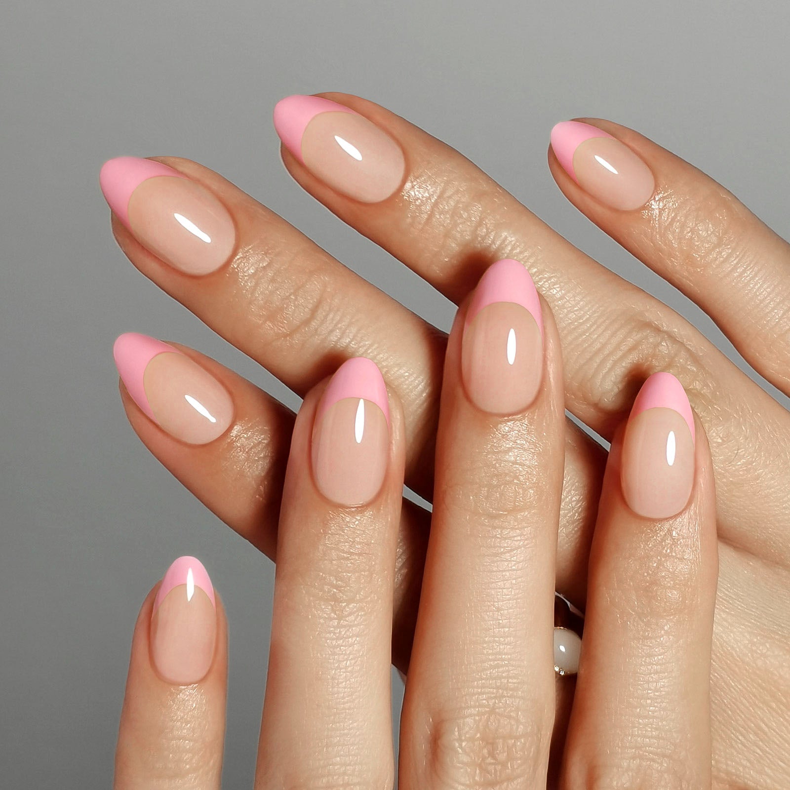 French Pink Almond Reusable Soft Gel Press-On Nails hand model close-up | SHANGMENG®