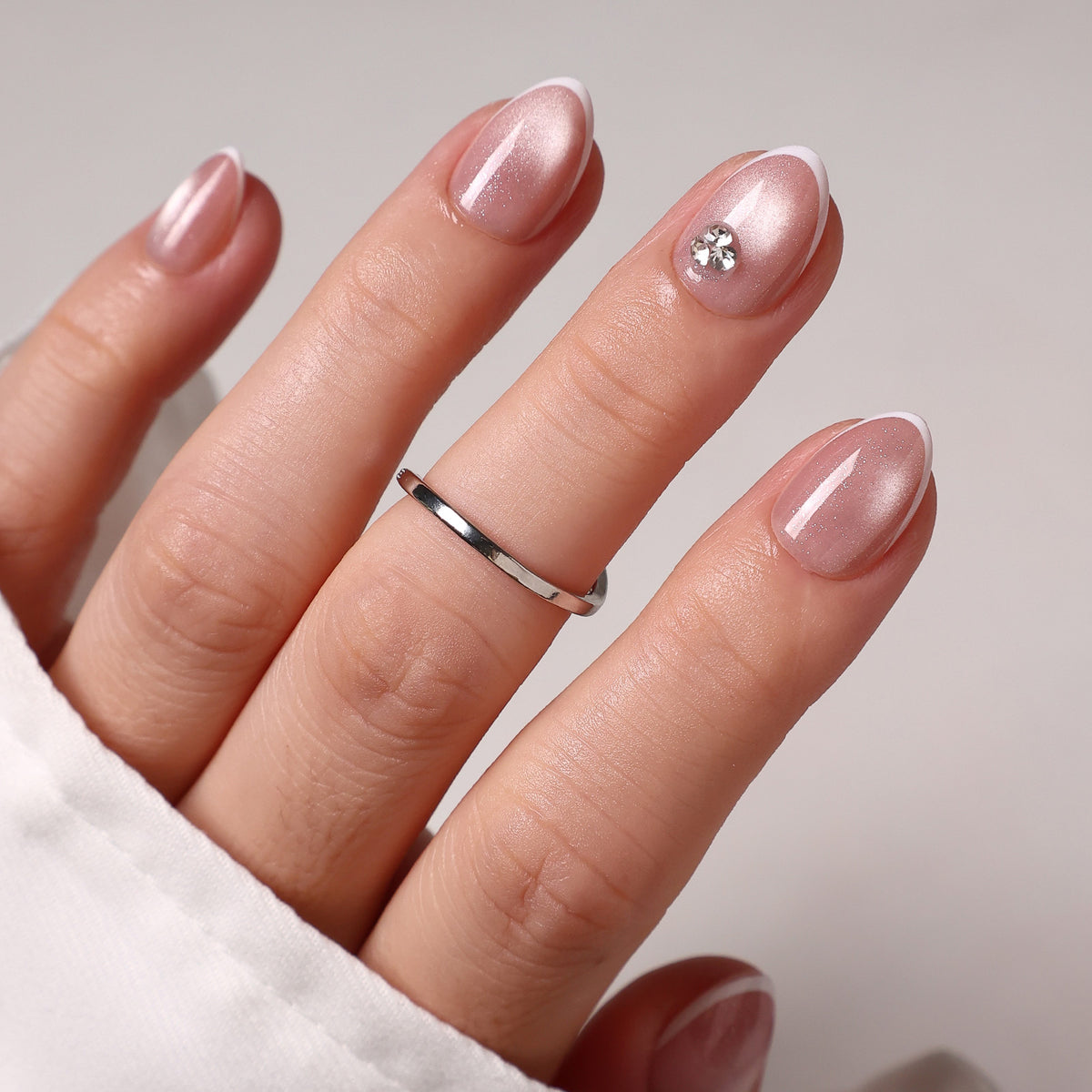 French Tip Cat Eye White Extra Short Almond Press-On Nails french tip macro detail view three | SHANGMENG®