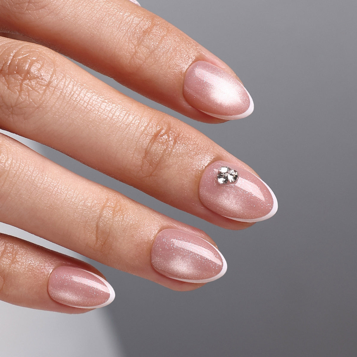 French Tip Cat Eye White Extra Short Almond Press-On Nails rhinestone accent macro view two | SHANGMENG®