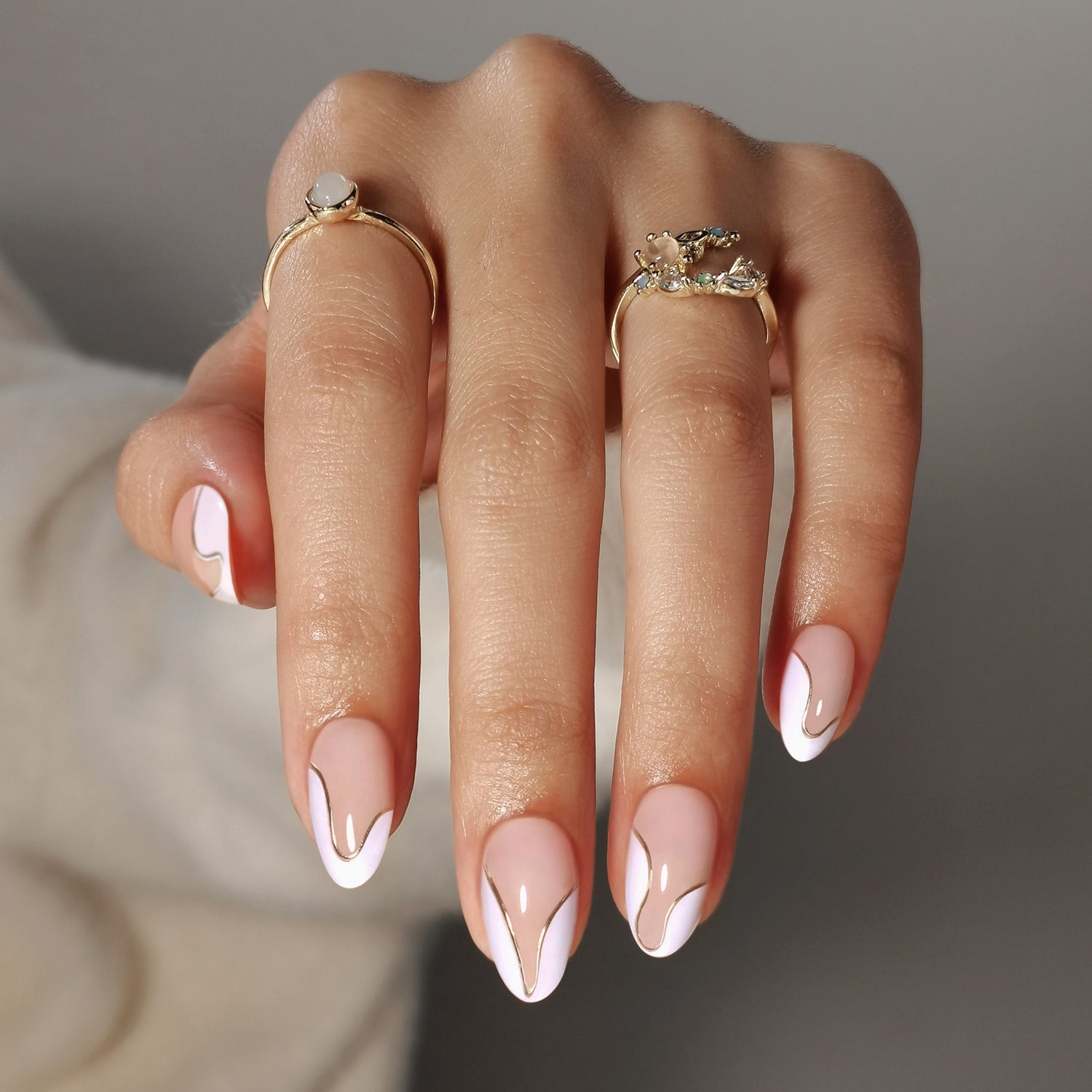 French Tip Gold Almond Reusable Soft Gel Press-On Nails main hand model view | SHANGMENG®