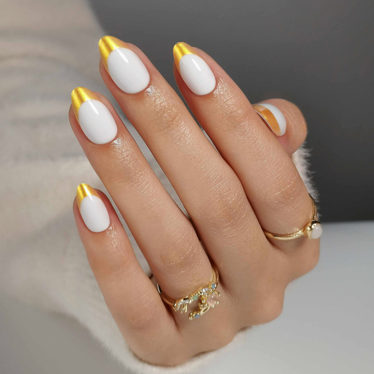 French White Gold Almond Reusable Soft Gel Press-On Nails finish close-up on hand | SHANGMENG®
