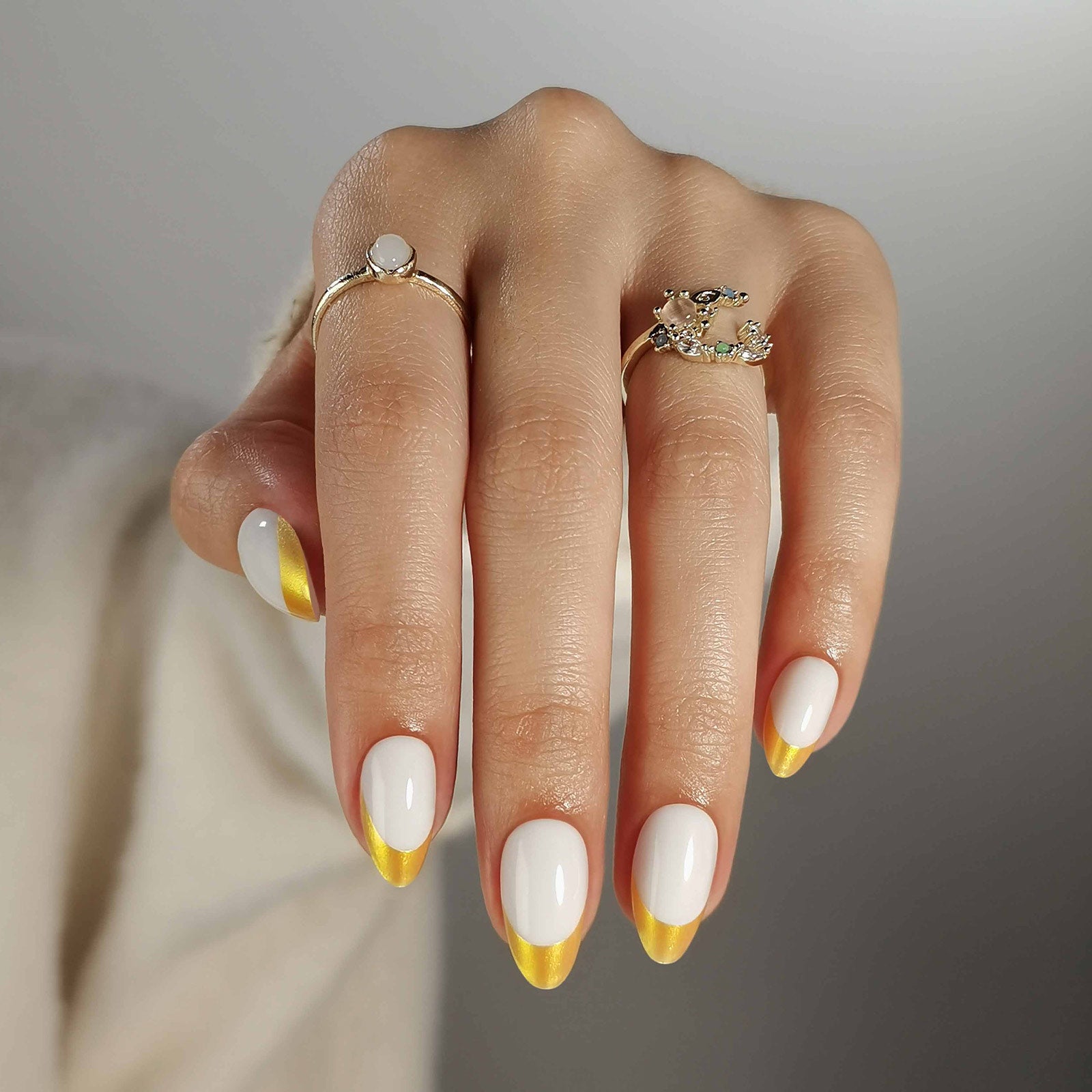 French White Gold Almond Reusable Soft Gel Press-On Nails hand model close-up | SHANGMENG®