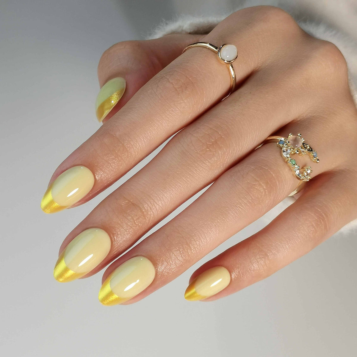 French Yellow Gold Almond Reusable Soft Gel Press-On Nails hand model detail | SHANGMENG®