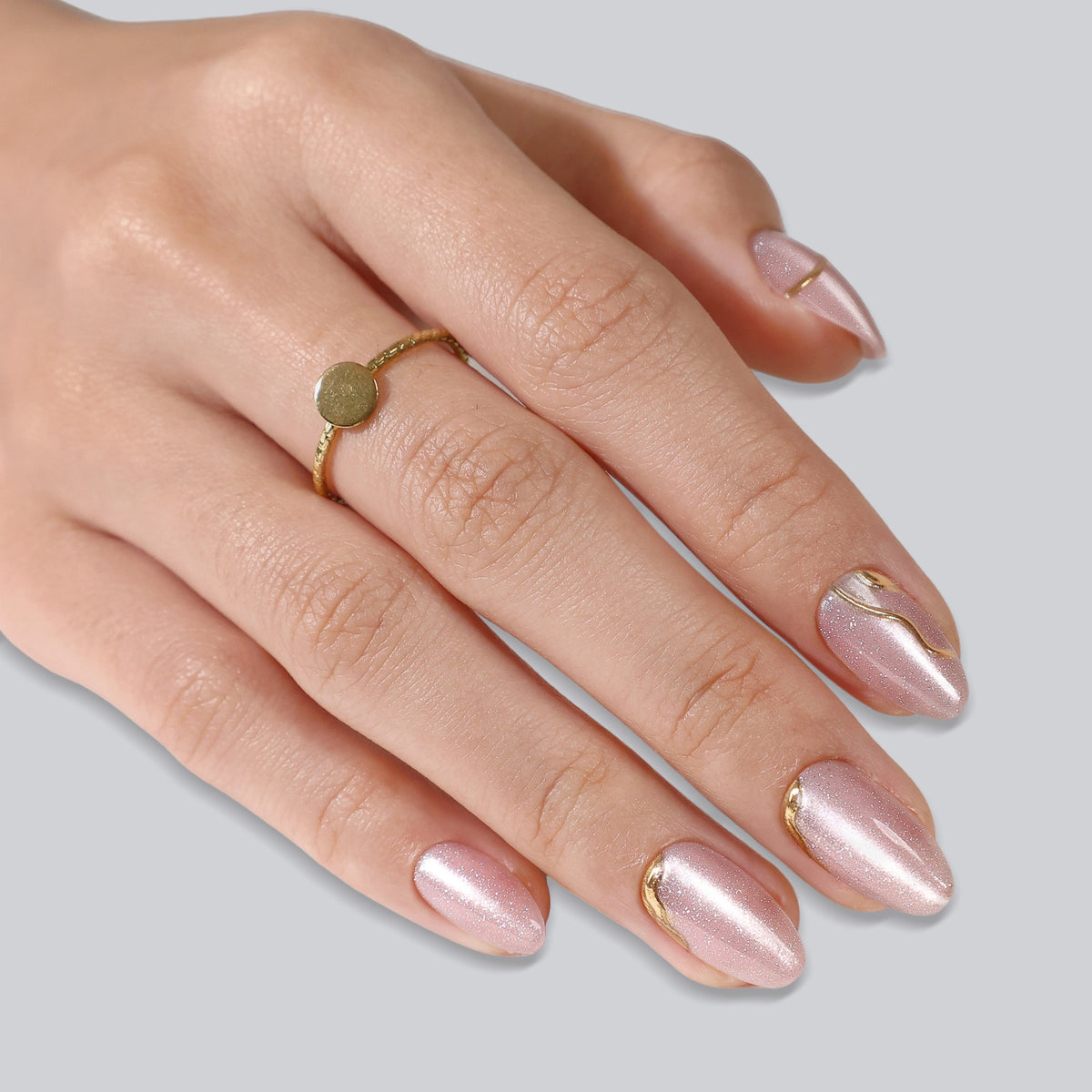 Gilded Glyphs Pink Cat Eye — Short Almond on hand raised view | SHANGMENG®