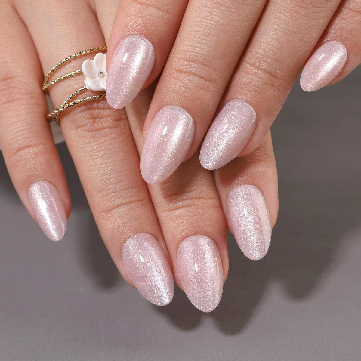 Glitter Pink Short Almond Reusable Soft Gel Press-On Nails angled hand view | SHANGMENG®