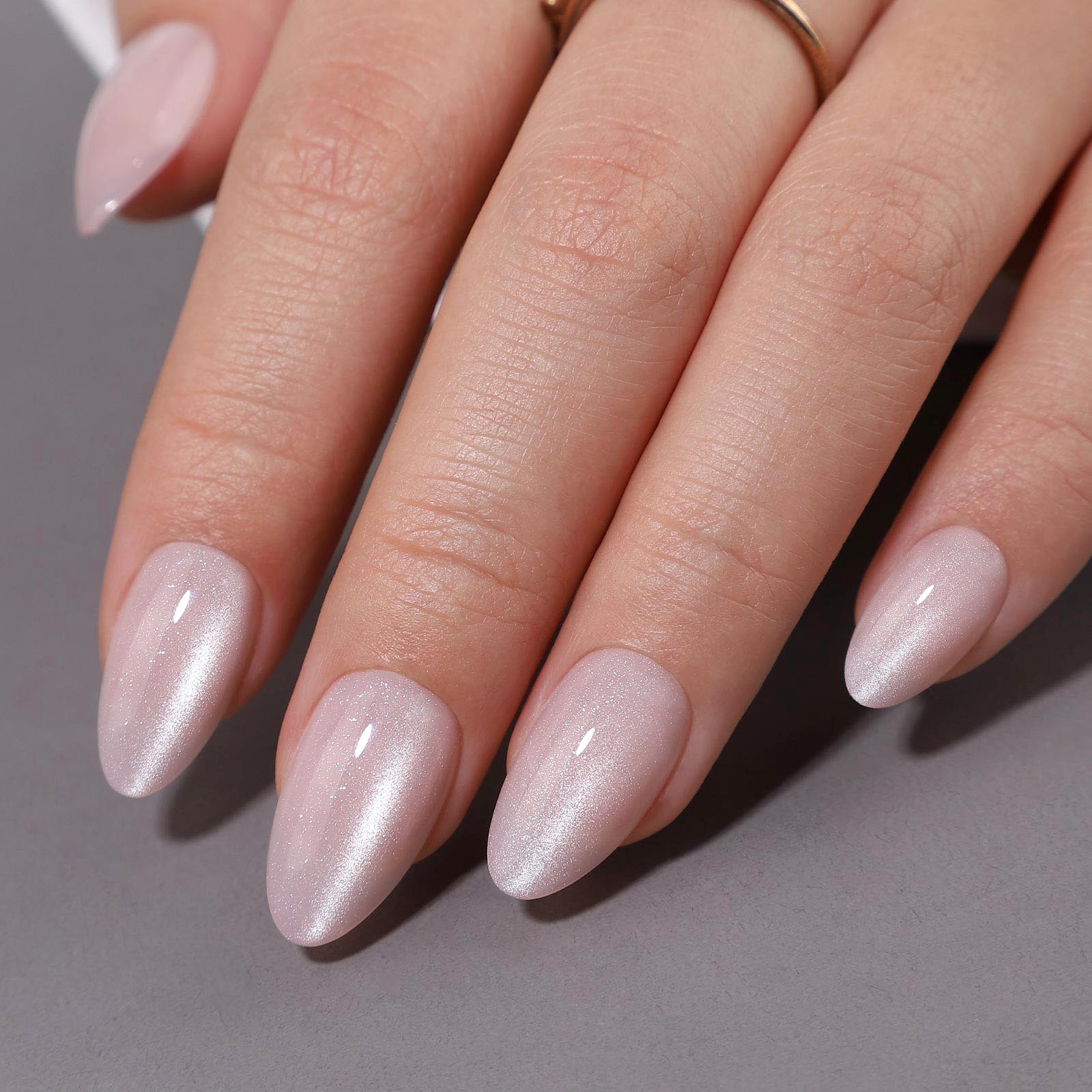 Glitter Pink Short Almond Reusable Soft Gel Press-On Nails finish close-up on hand | SHANGMENG®