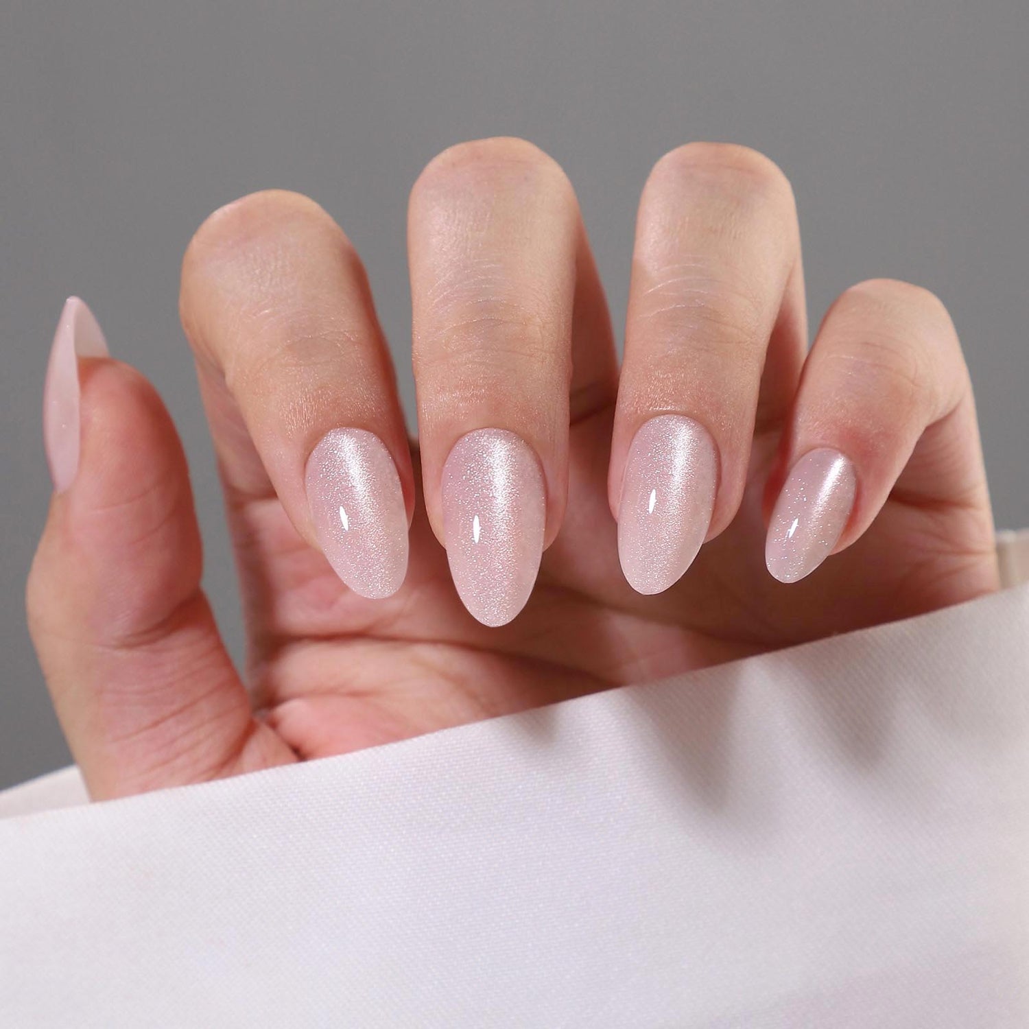 Glitter Pink Short Almond Reusable Soft Gel Press-On Nails main hand model view | SHANGMENG®