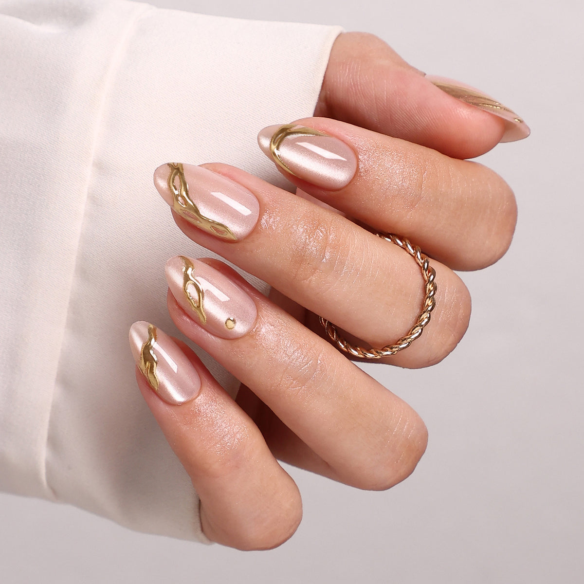 Gold Carving Cat Eye 3D Short Almond Press-On Nails finish close-up on hand | SHANGMENG®