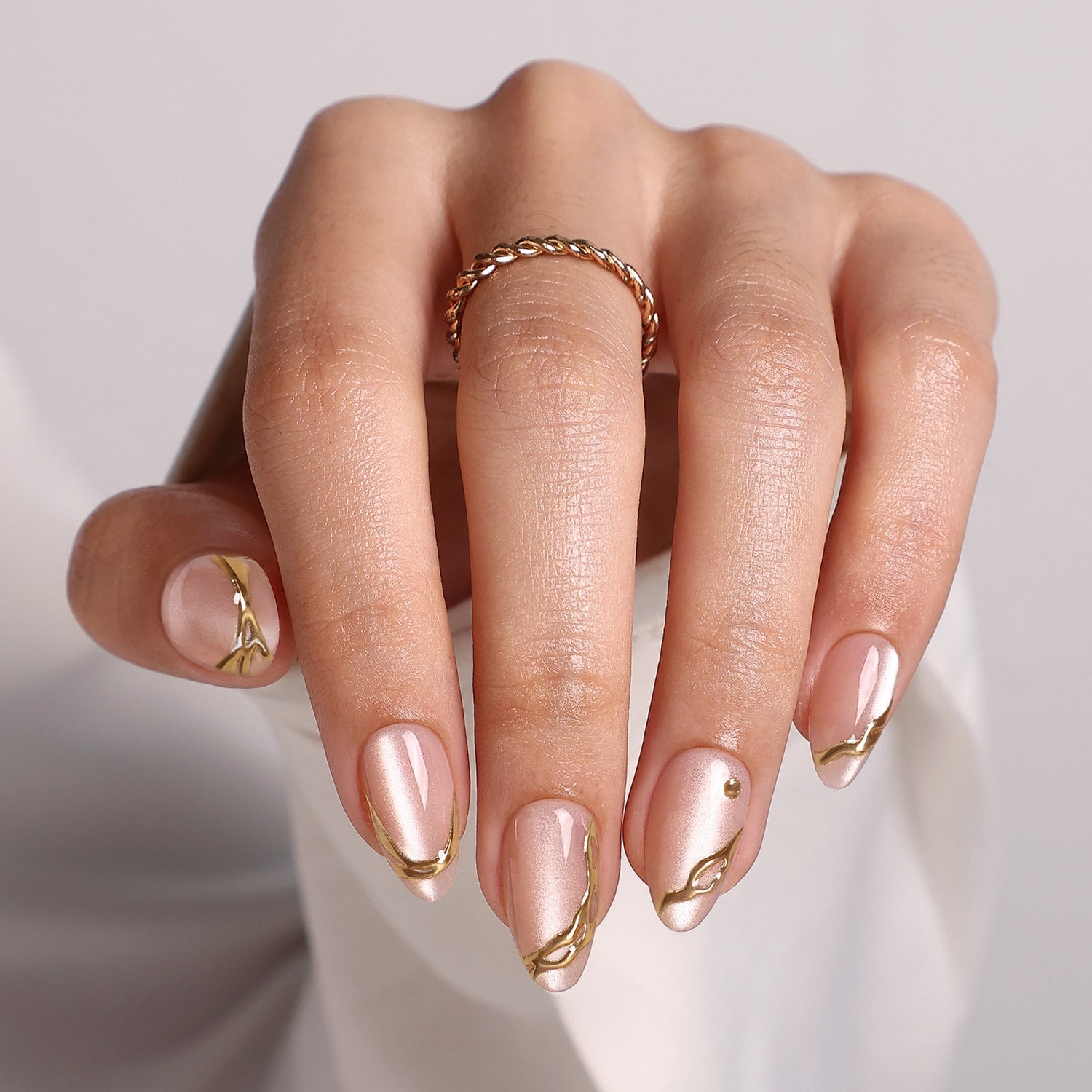 Gold Carving Cat Eye 3D Short Almond Press-On Nails main hand model view | SHANGMENG®