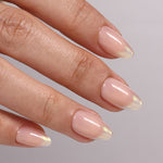 Auric Blush Puntas francesas doradas — Almendra corta vista del producto en la mano 4 | SHANGMENG®