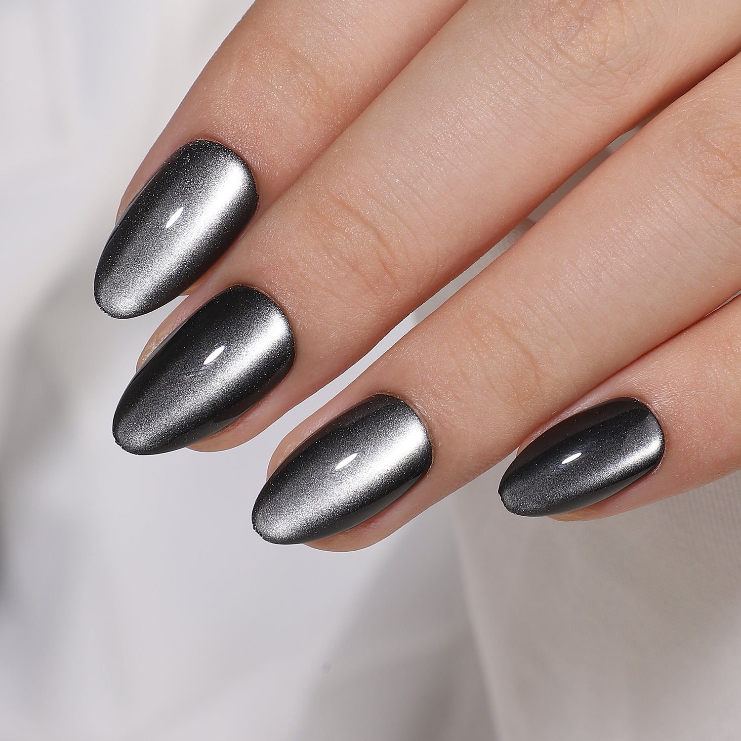 Spooky Black Cat Eye Almond Nails