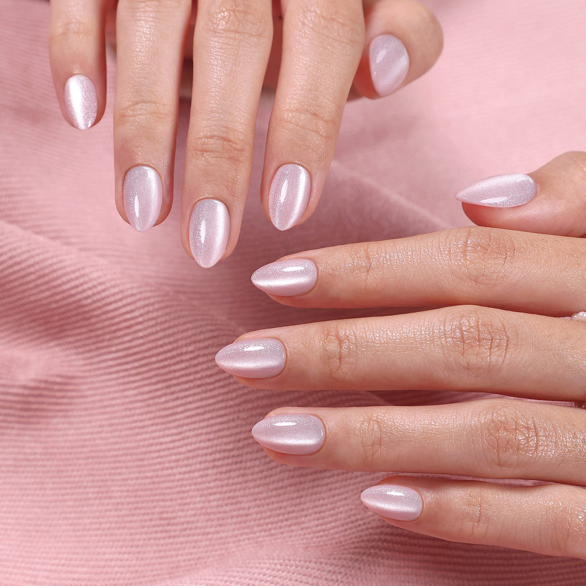 Pearl Blush Cat Eye — Extra Short Almond lifestyle atmosphere on blush pink fabric | SHANGMENG®