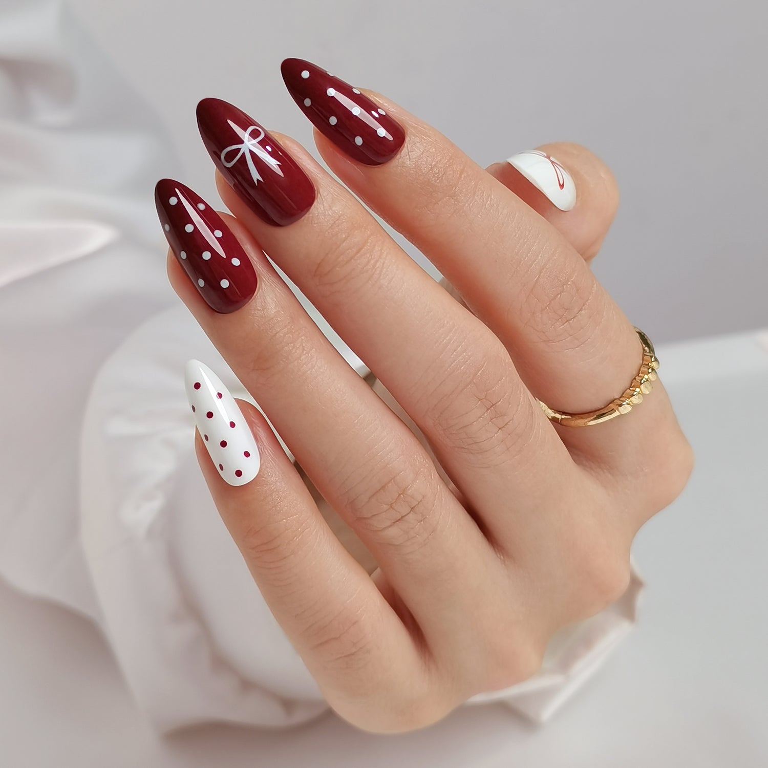 Polka Dot Dark Red and White Almond Nails