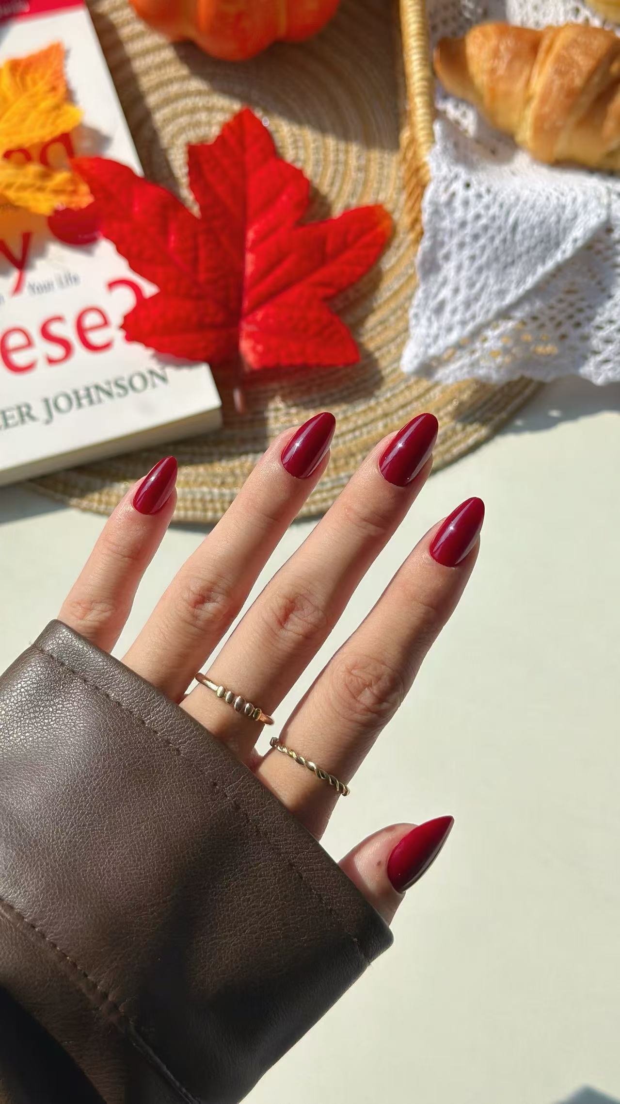 Wine Dark Red Short Almond Press-on Nails on hand angle view | SHANGMENG®