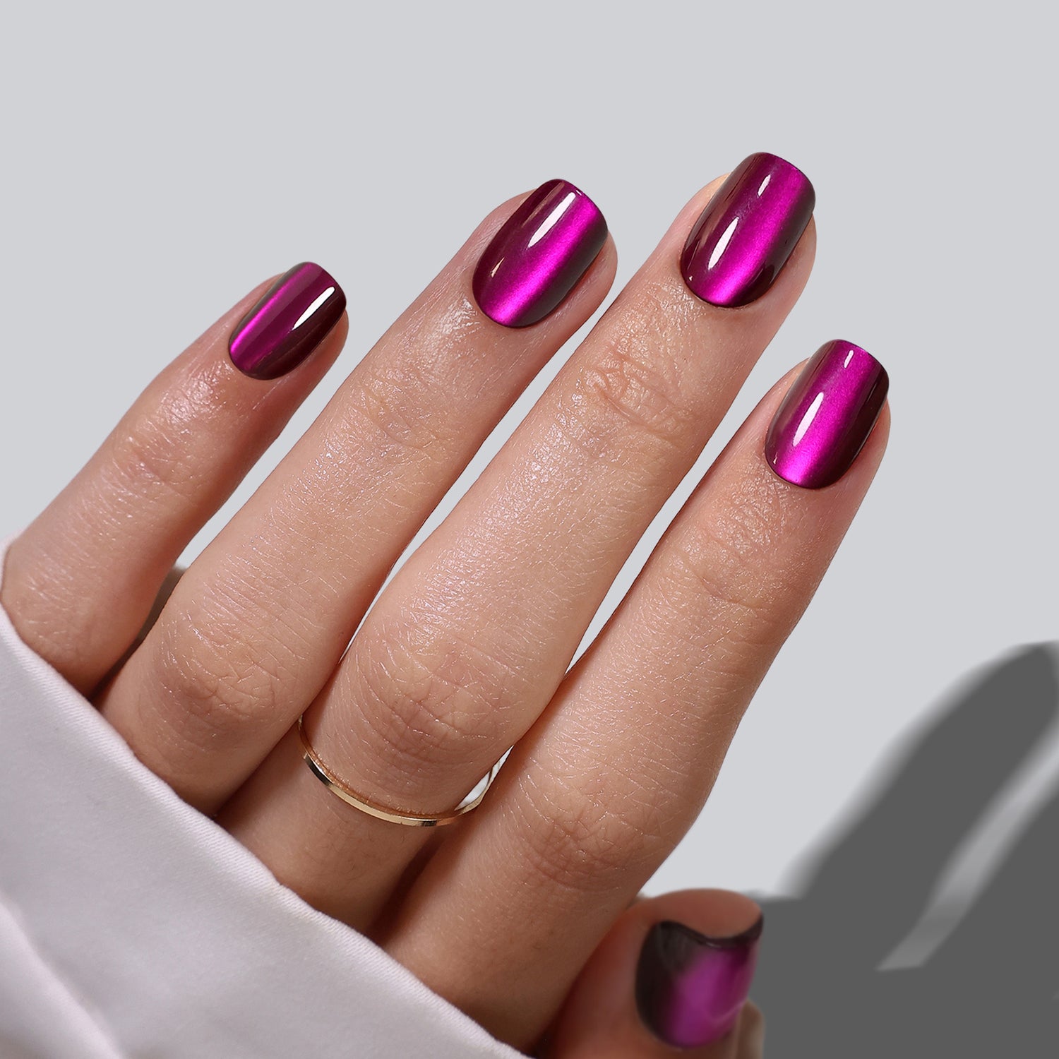 Purple cat eye short square soft gel press-on nails on hand 1 | SHANGMENG®