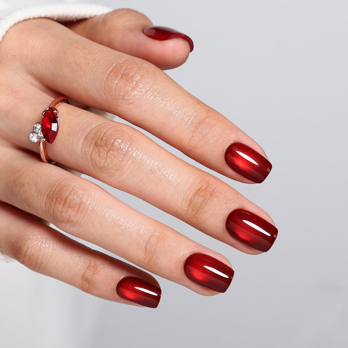 Ruby Halo Wine Cat Eye — Short Square side hand finish view of the ruby halo cat-eye wine short square manicure | SHANGMENG®