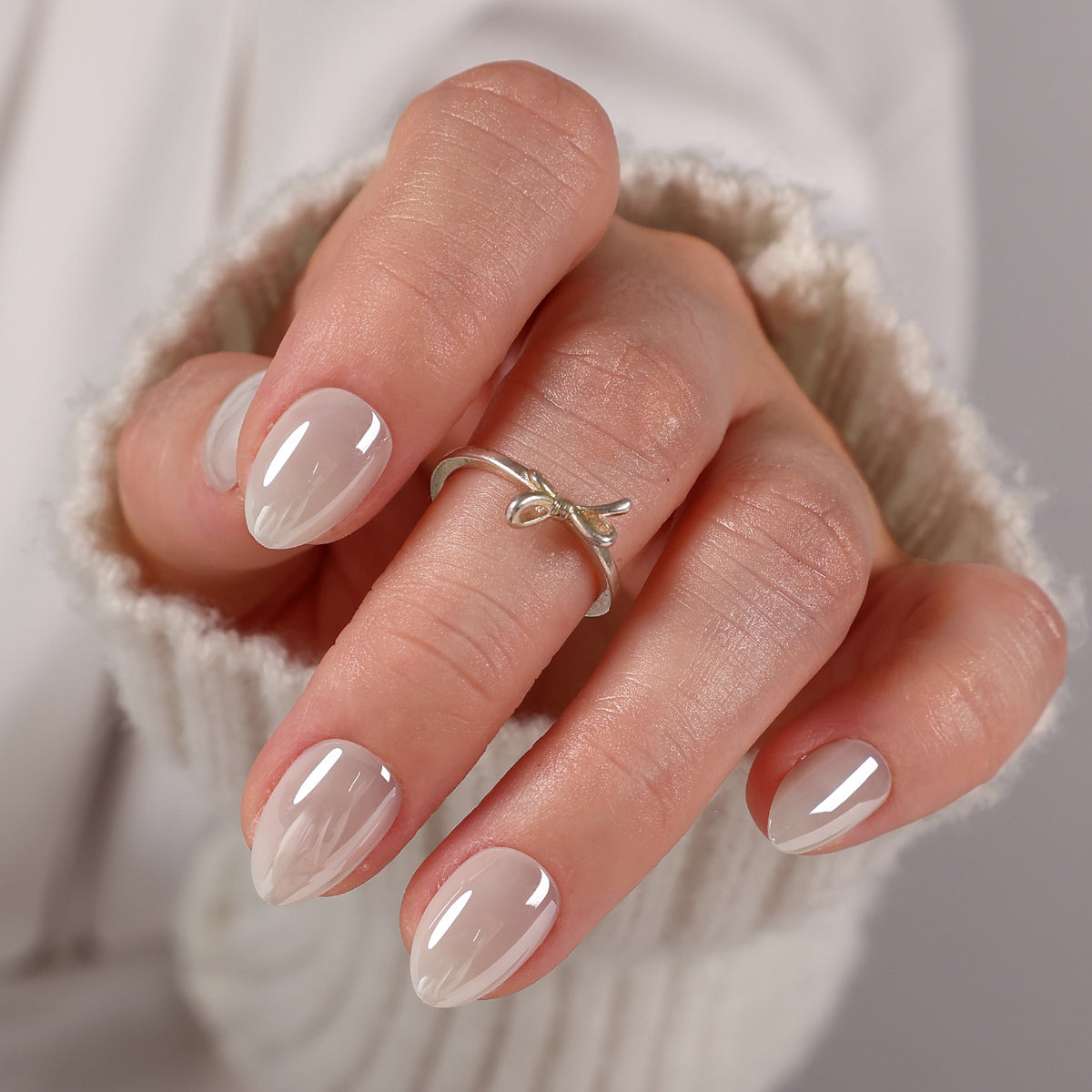 White Mirror Chrome Extra Short Almond Press-On Nails angled hand view | SHANGMENG®